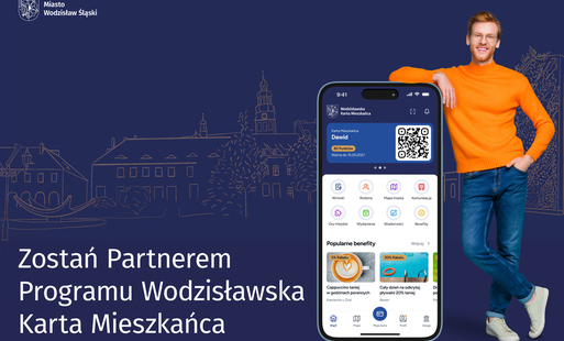 męźczyzna stojący obok telefonu komórkowego